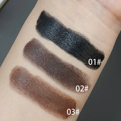 Three swatches of eyeshadow on a person's arm with labels indicating shades 01#, 02#, and 03#. The swatches are black, brown, and a darker brown.