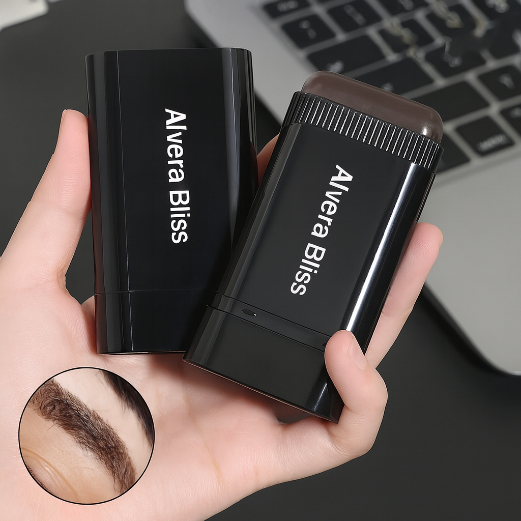 Two black Alvera Bliss products held in a hand with a laptop in the background.